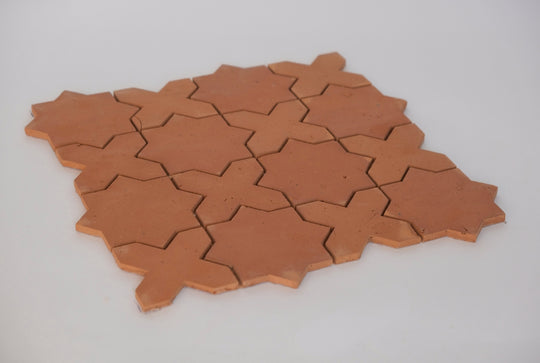 Terracotta tiles in star and cross pattern
