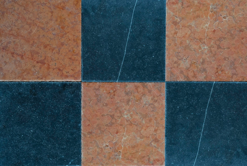 Checkered pattern of black and red tiles