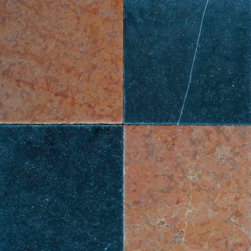Four square tiles with different black and red patterns